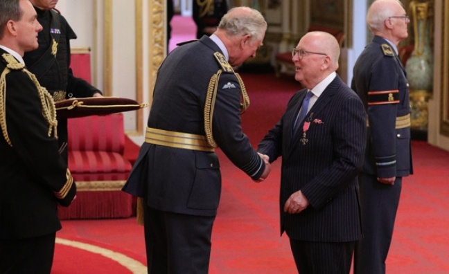UTA's Neil Warnock receives MBE at Buckingham Palace