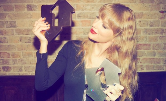 Taylor Swift breaks more chart records as Midnights tops 200,000 sales
